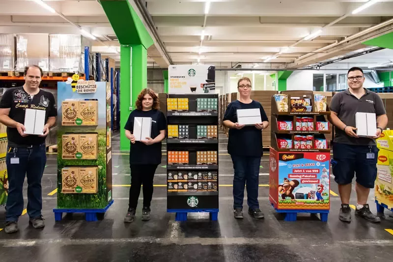 FAB ProWork Linz Mitarbeiter mit Nestlé Produkten